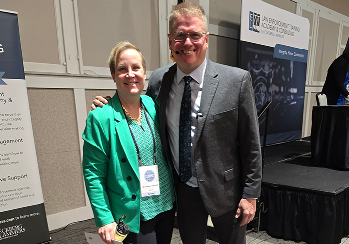 Presenters Dustin Reichert & Shauna "Doc" Springer speaking at a mental health conference.