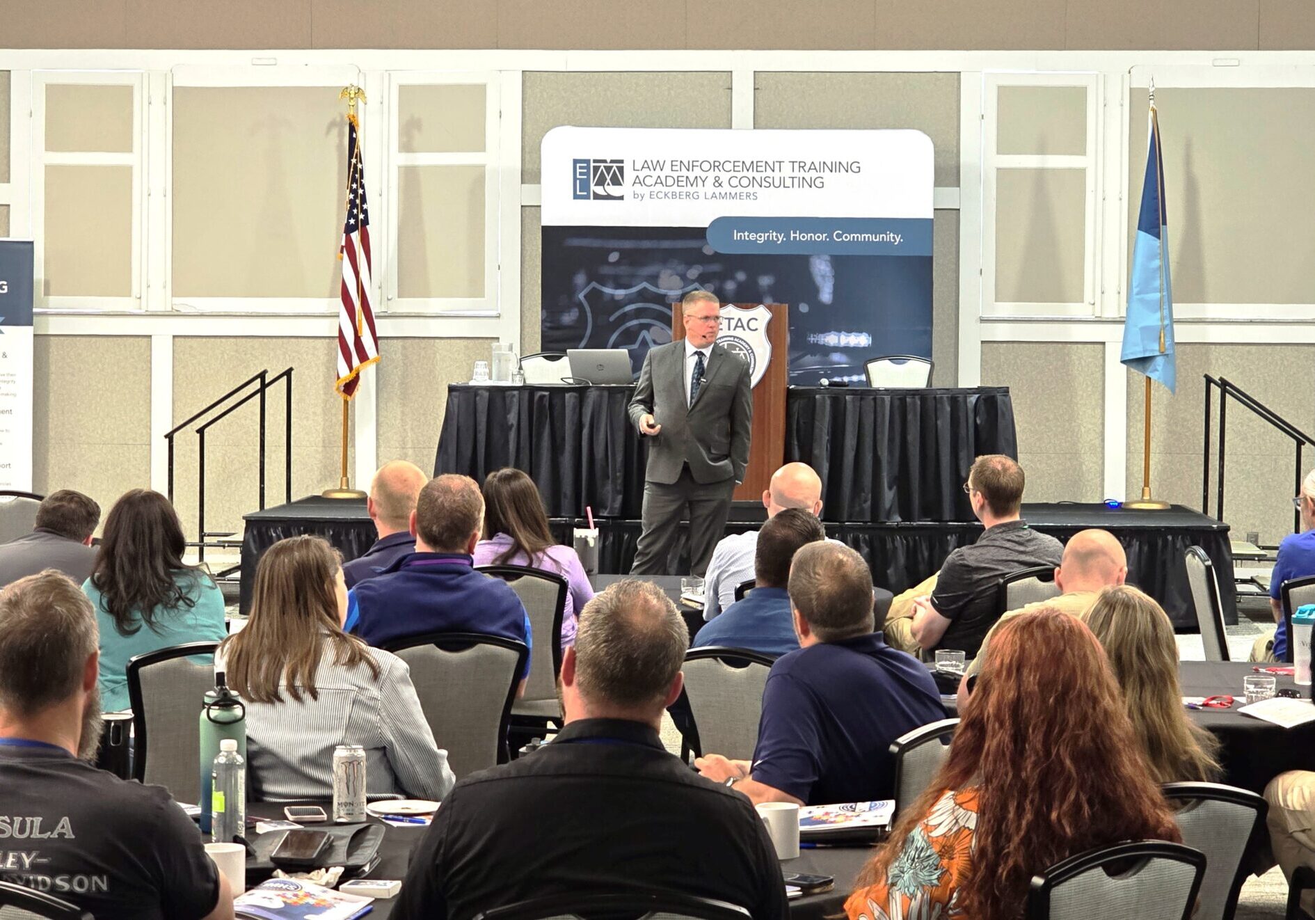 Dustin Reichert speaking at LETAC Mental Health Summit